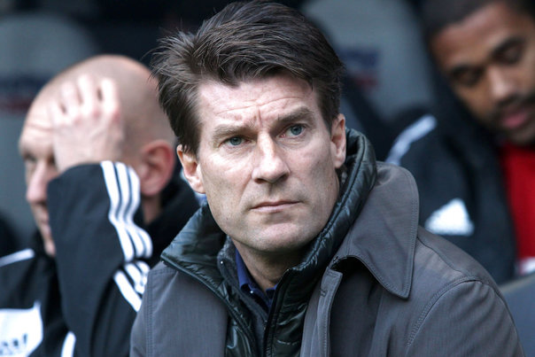 Michael Laudrup håber at UEFA straffer Adriano Foto: Ed Sykes